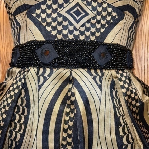 Nanette Lepore size 2. Gorgeous Black and gold Cocktail dress . Beaded waist . - Picture 3 of 6